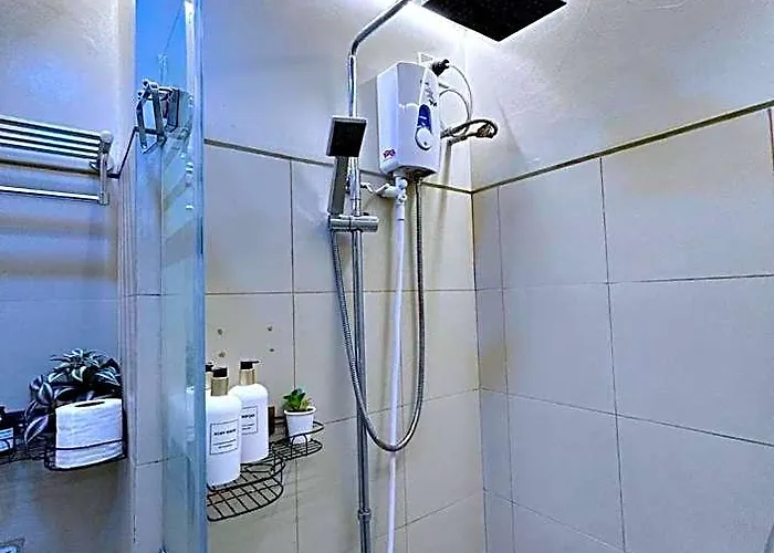 Cozypura Staycation Near Moa, Airport , With Free Fast Wifi, Netflix And Pay Parking 4*